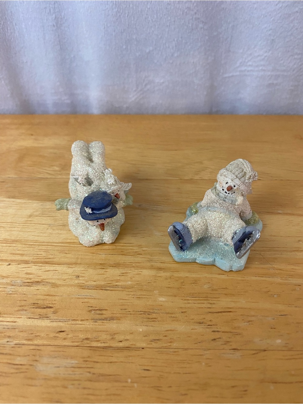 1990s Russ White Glitter Snowman Pair with Blue Hats and Accents